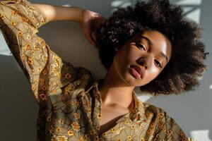 Woman Laying on Ground Wearing Floral Shirt photo