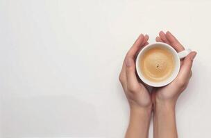 Person Holding a Cup of Coffee photo