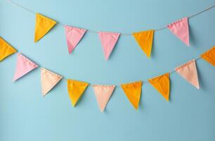 Blue Wall With Yellow and Pink Bunting photo