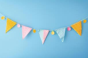 Blue Wall With Yellow and Pink Bunting photo