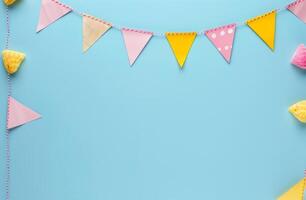 Blue Background With Yellow and Pink Paper Buntings photo