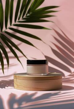 Pink Container With Black Lid on Pink Surface photo