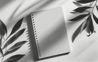 Notebook and Pen on Desk photo