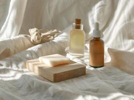 Essential Oil Bottle Next to Soap Block photo