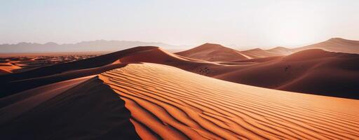 Sun Setting Over Sand Dunes photo
