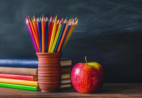 Red Apple on Stack of Books photo