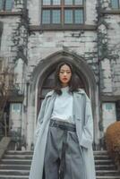 Woman Standing in Front of Building photo