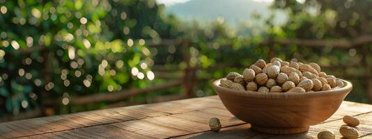 Wooden Bowl Filled With Nuts on Wooden Table photo