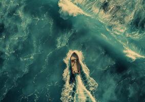 Small Boat Sailing in Ocean photo