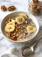 Nutritious Bowl of Oatmeal With Bananas and Nuts photo