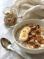 Nutritious Bowl of Oatmeal With Bananas and Nuts photo