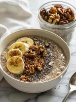 Nutritious Bowl of Oatmeal With Bananas and Nuts photo