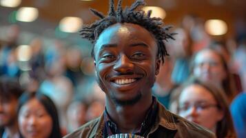 Man With Dreadlocks Smiles at Camera photo