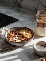 A Bowl of Granola and a Glass of Milk photo