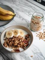 A Bowl of Granola and a Glass of Milk photo
