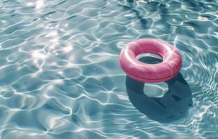 Pink Ring Floating in Water photo