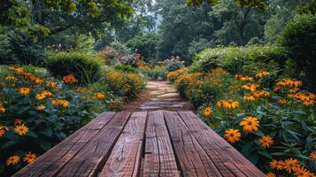 Wooden Table in Garden With Flowers photo