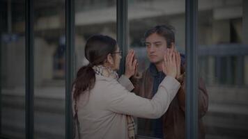 Reunion of Single Mother and Teenage Son Hugging at Railway Platform video