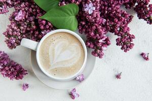 Cup of coffee with heart latte art photo