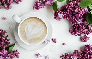 Cup of coffee with heart latte art photo