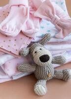 Stack of Baby bodysuits. photo