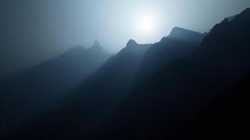 The captivating sight of mountain outlines amidst a dusky dreamlike atmosphere photo