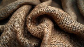 Closeup of the rustic co texture of woven burlap used for 19th century peasant clothing showcasing the durability of this textile photo