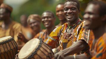 The lively rhythms of drums and other traditional instruments fill the air providing a contagious beat that invites everyone to dance along photo