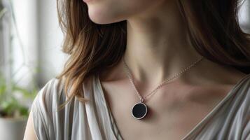 A smart necklace with a sensor that tracks sleep patterns and sends suggestions for improving sleep quality photo