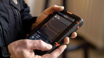 A handheld device with a touch screen display allowing users to view and analyze their ECG data on the go photo