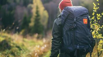 A discreet patch on a backpack s tracking the wearers exposure to harmful UV rays while out hiking or camping photo