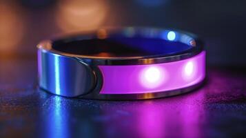 A closeup of a UV tracking bracelet with a miniature UV sensor and an adjustable band to fit all sizes photo