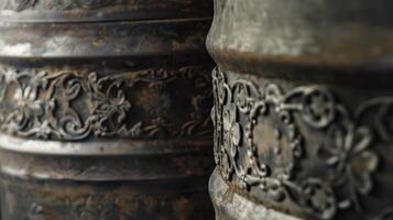 A closeup of a barrels metal bands reveals intricate designs and patterns etched into the metal adding to the rustic charm of the storage facility photo