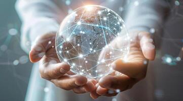 A man is holding a globe with a network of lines surrounding it. Global communication concept. photo