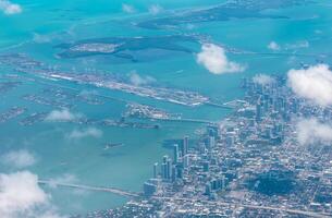 Miami harbor and downtown financial skyline aerial view from high above photo