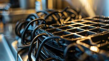 Closeup of a waffle makers cord management system neatly wrapped around the back of the machine for tidy storage photo