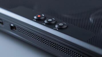 A closeup of the range extenders power button which allows for convenient onoff control of the device photo