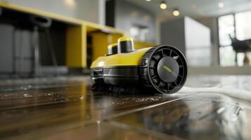 A detailed view of the rotating brush attachment perfect for loosening and lifting stubborn particles for a thorough clean photo