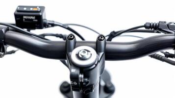The handlebars with safety features such as an emergency shutoff button and a triggerstyle power switch photo