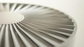 A detailed shot of the fans minimalist design with simplistic blades and neutral colors photo