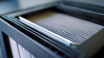 A closeup of the replaceable filters in an air purifier emphasizing the importance of regular maintenance for optimal performance photo