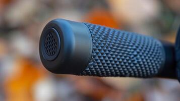 A closeup of the handle featuring a textured grip for comfortable carrying of the heater photo