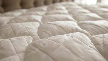 An image of the quilted design of the heated mattress pad providing both a cozy texture and ensuring the heating elements stay in place photo