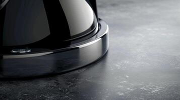 The smooth and sleek power base of an electric kettle with just one button to effortlessly turn it on and off photo