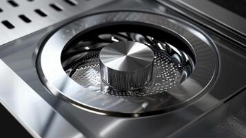 A view of a blenders blade from above showcasing its sharp edges and multilevel design photo