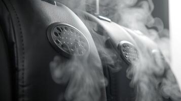 An upclose view of the dual steam vents on a highpowered garment steamer evenly distributing steam for quicker and more efficient steaming photo