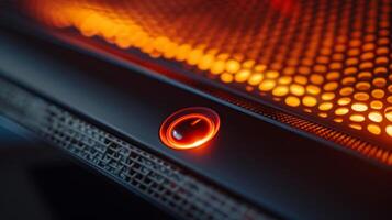 Detail shot of the oscillation button allowing the heater to rotate and distribute heat evenly throughout the room photo