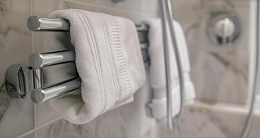 The back of a towel warmer showing the electrical cord and plug photo