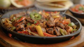 As the platter of fajitas approaches your table the sizzling sound gets louder and the scent of grilled meat and vegetables intensifies. Its a feast for the eyes and the tast photo