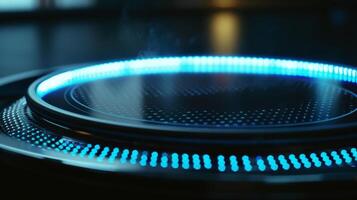 The shimmering blue ring of light that appears around an induction cooktops heating element when it is in use photo
